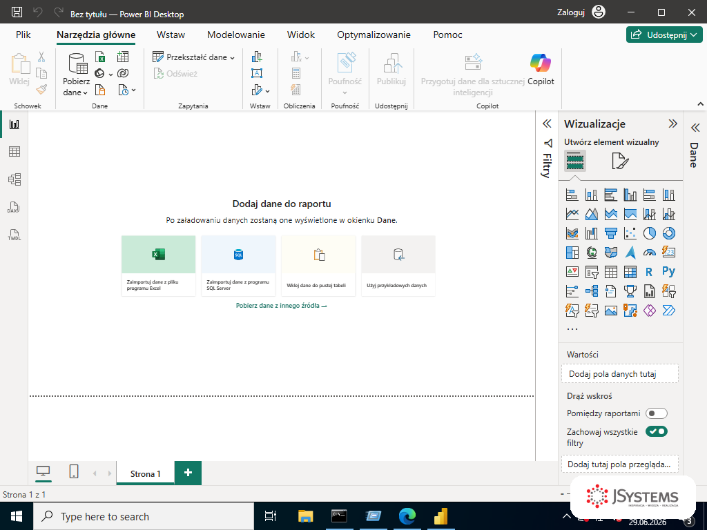 Interfejs Power BI Desktop z pusta kanwa, wstazka u gory i panelami Wizualizacje oraz Pola po prawej